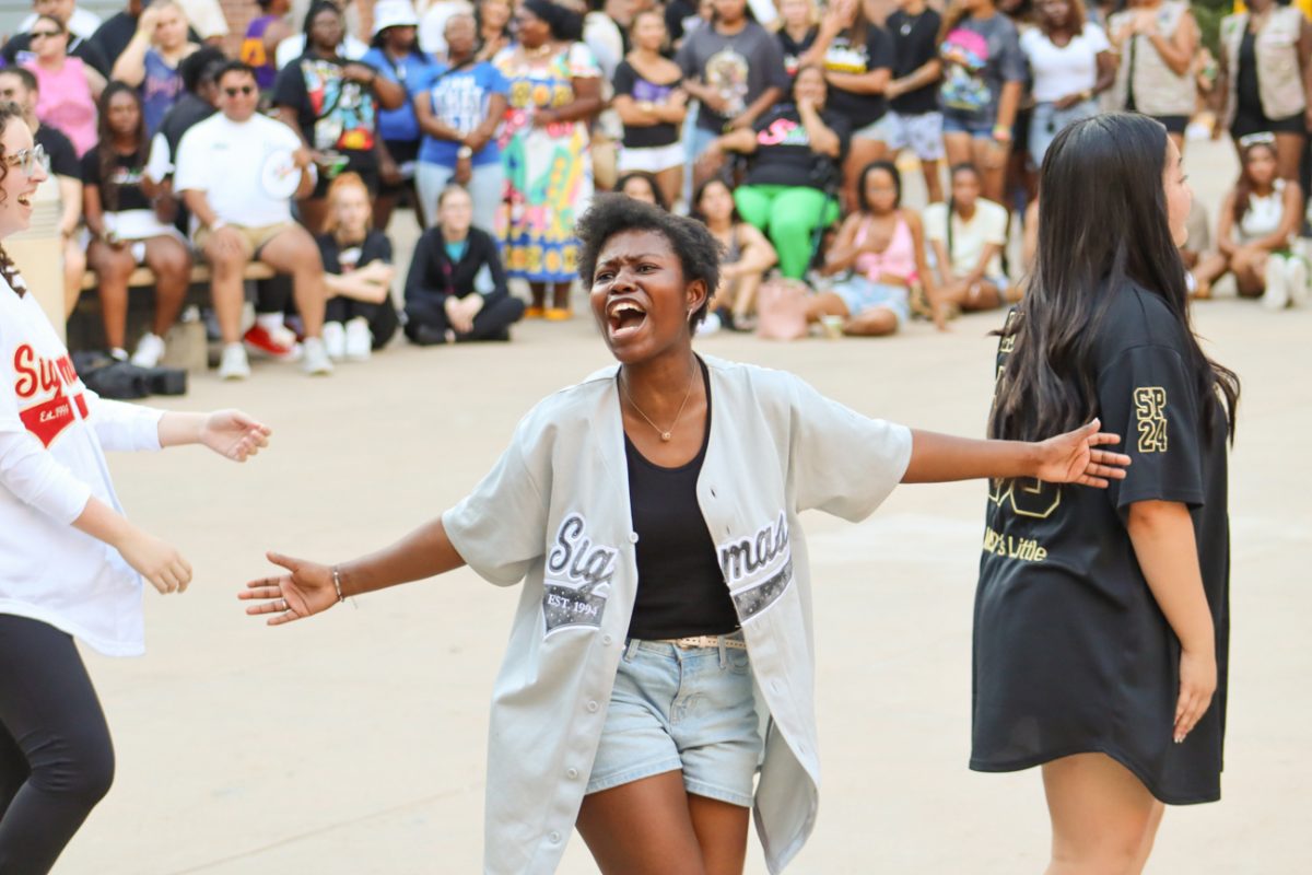 Junior NaMari Moss gets the crowd hyped. Moss is a member of Sigma Psi Zeta Sorority.