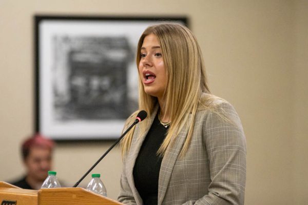 Kylee Hower, the student body president, delievers the State of the Student Body address. Hower spoke Wednesday night about discrimination she's faced as a woman in leadership, the duties and responsibilities of Student Government and unfinished Senate business.