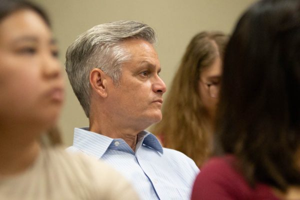 University President Richard Muma listens to the State of the Student Body address on Sept. 11. Muma is facing allegations of plagiarism, prompted by an article by the Kansas Reflector.