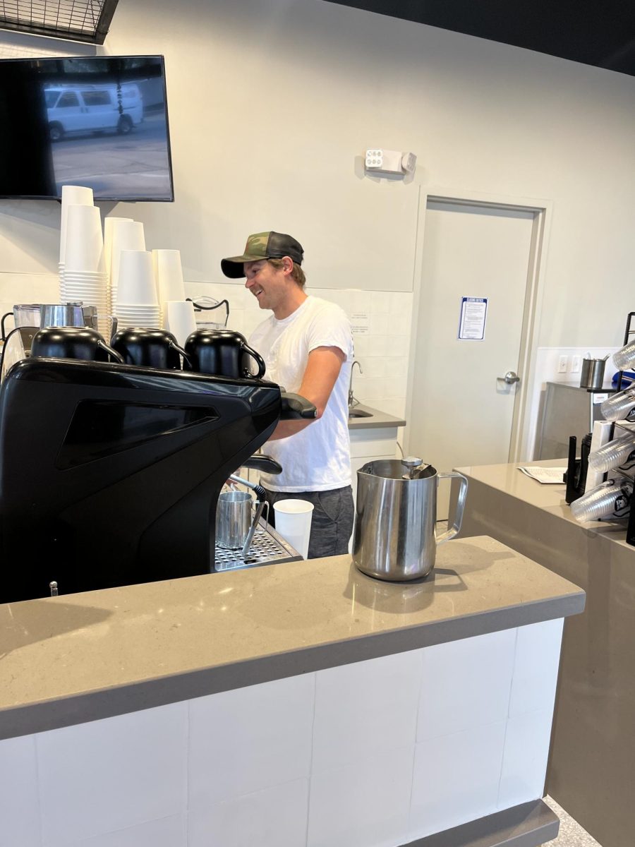 Andrew Siedhoff, one of the founders of Buffalo Brew Coffee Company, prepares a drink. The cafe opened in March 2024 at 150 N. Main. 