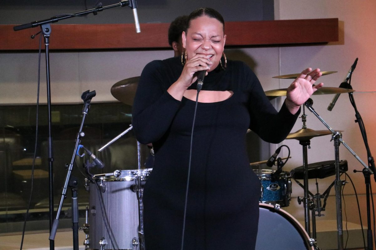 Kimberly Paige, of the Kimberly Paige Quintet, a jazz singer, performs at the Mini Music Fest in the Rhatigan Student Center on Sept. 20. The Students Activities Council hosted the event with vendors accompanying live music.