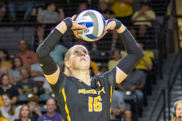 Fifth-year Wichita State setter Izzi Strand sets up a teammate during the game against Kansas State. Strand was fifth in the NCAA in assists last season.