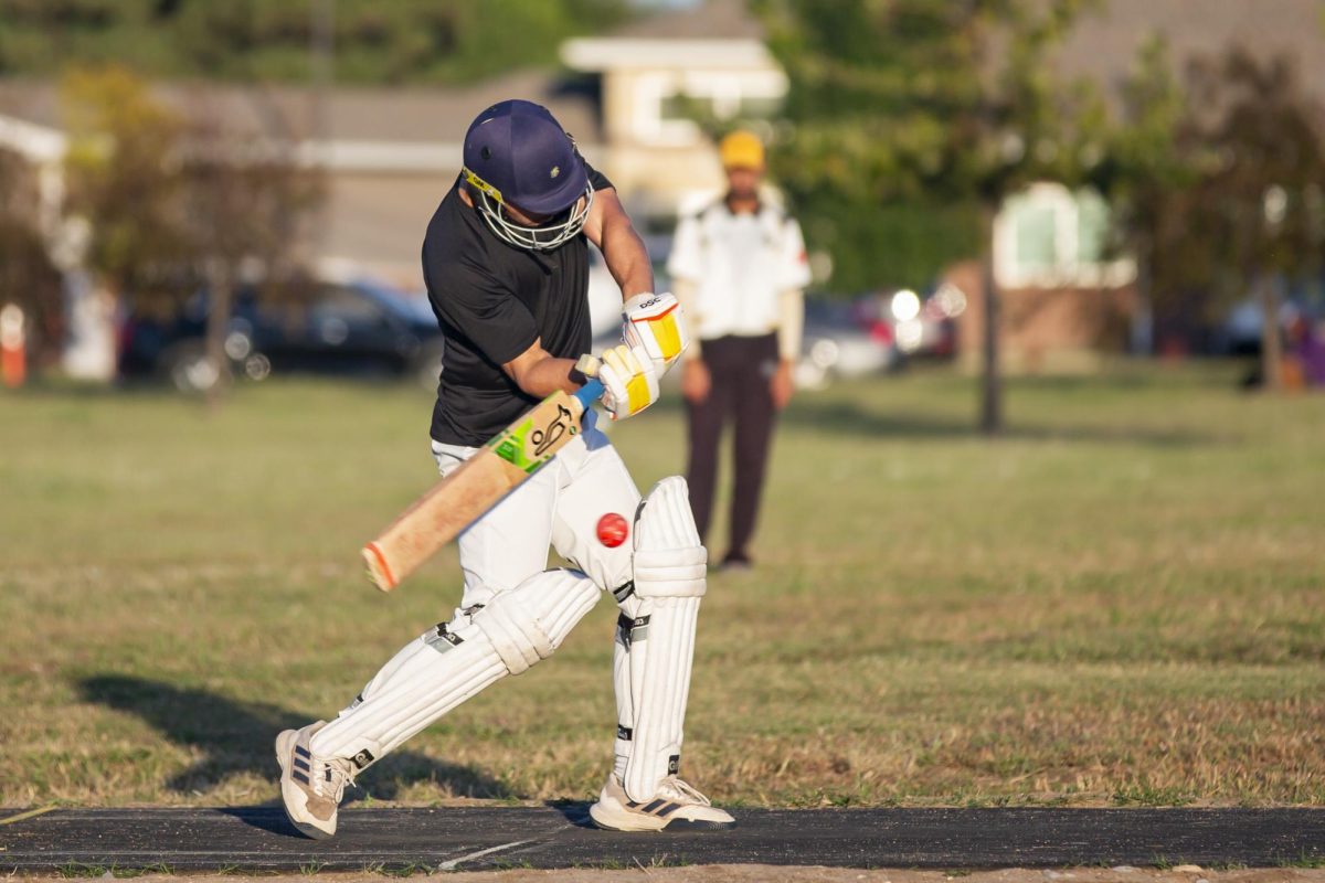 Kamran Hafeez prepares to hit the ball, delivered by a fellow teammate. Hafeez is one of more than 100 members on Wichita State's Cricket Club team.