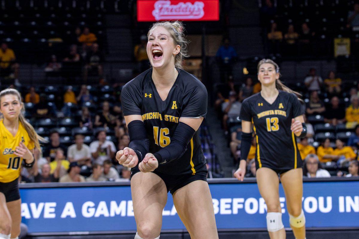 Senior setter Izzi Strand celebrates after a point in the third set against UNC. The Shockers won the third set, but ultimately fell to Northern Colorado 3-1.