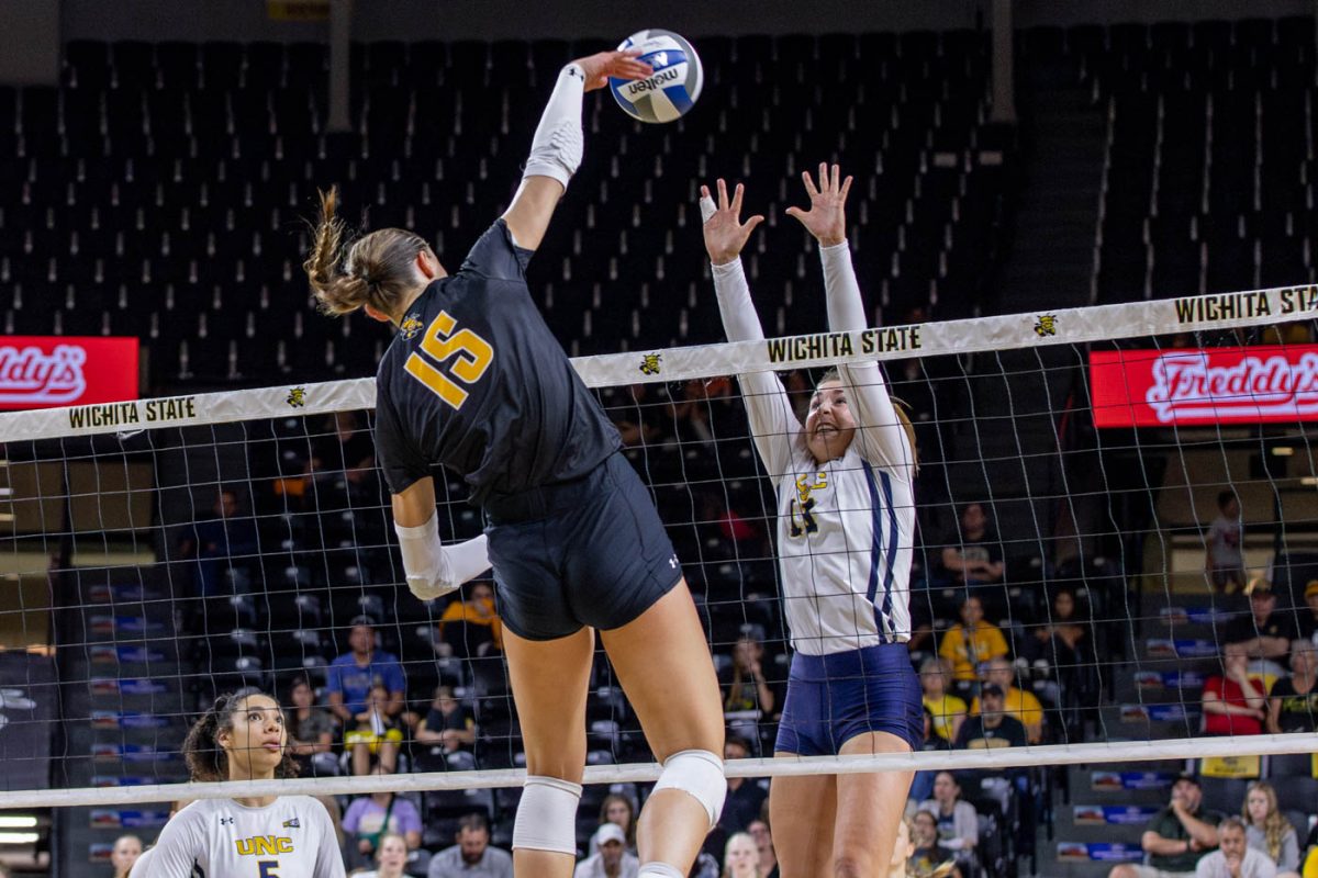 Senior middle blocker Morgan Stout hits the ball over the net during the fourth set against UNC on Sept. 20.