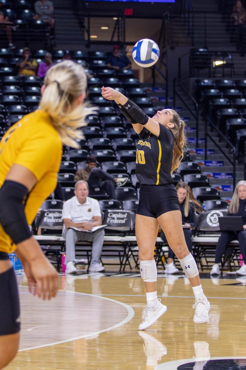 Annalie Heliste passes the ball to a teammate during the second set. Heliste made 11 digs and five assists during the game against Rice.