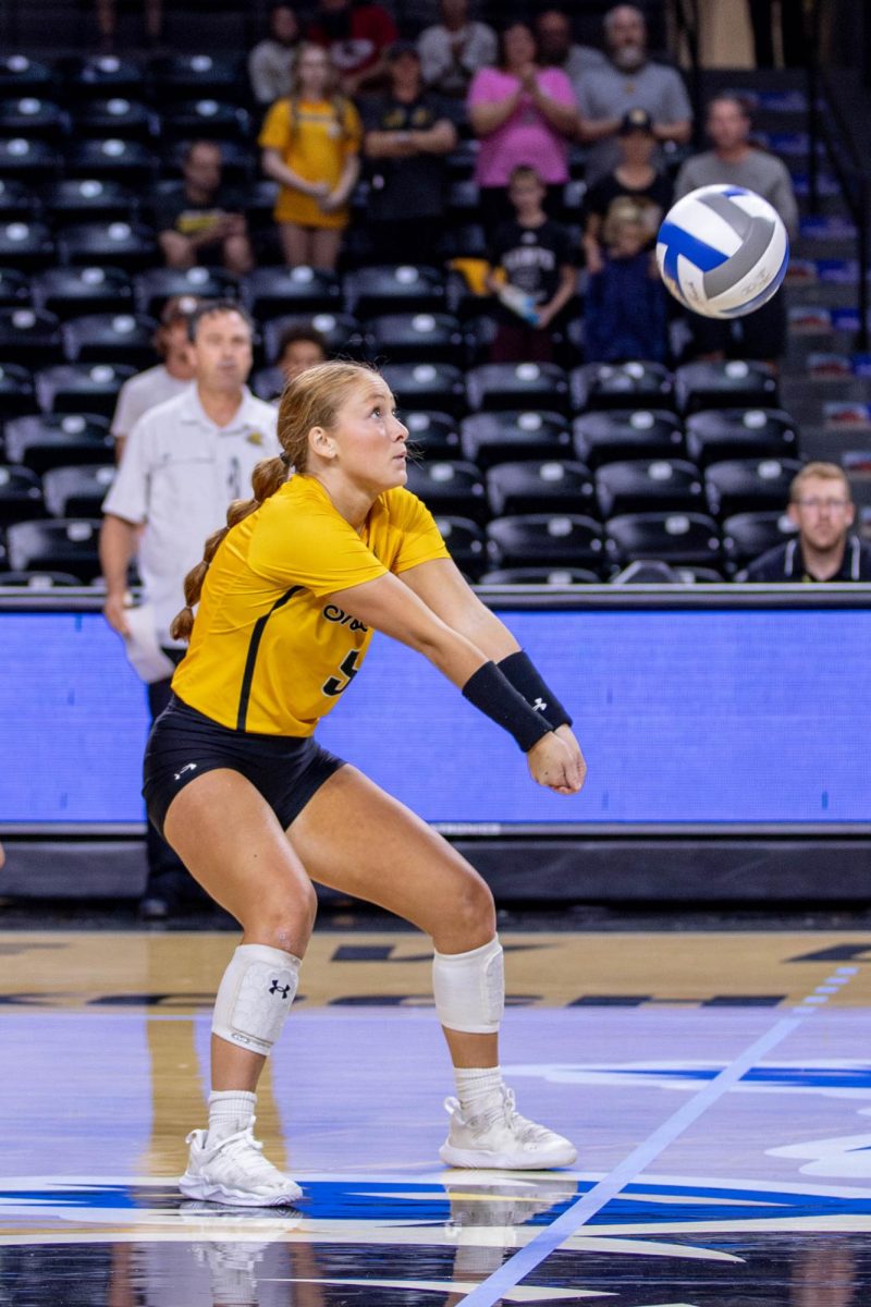 Reagan Anderson recieves the ball from Rice in the second set. Anderson, a sophomore, made six digs during the game.