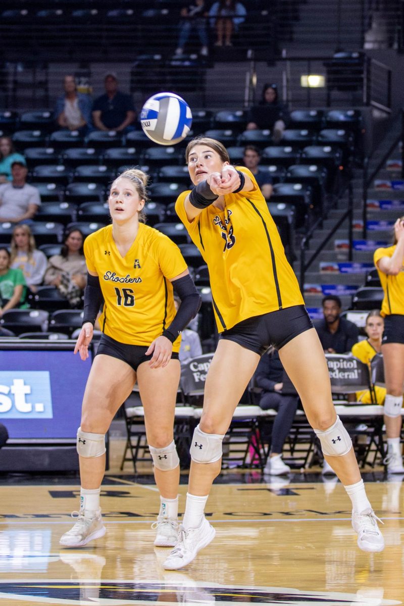 Emerson Wilford passes the ball to a teammate in the third set. Wilford scored 12.5 points for the Shockers on Oct. 6.