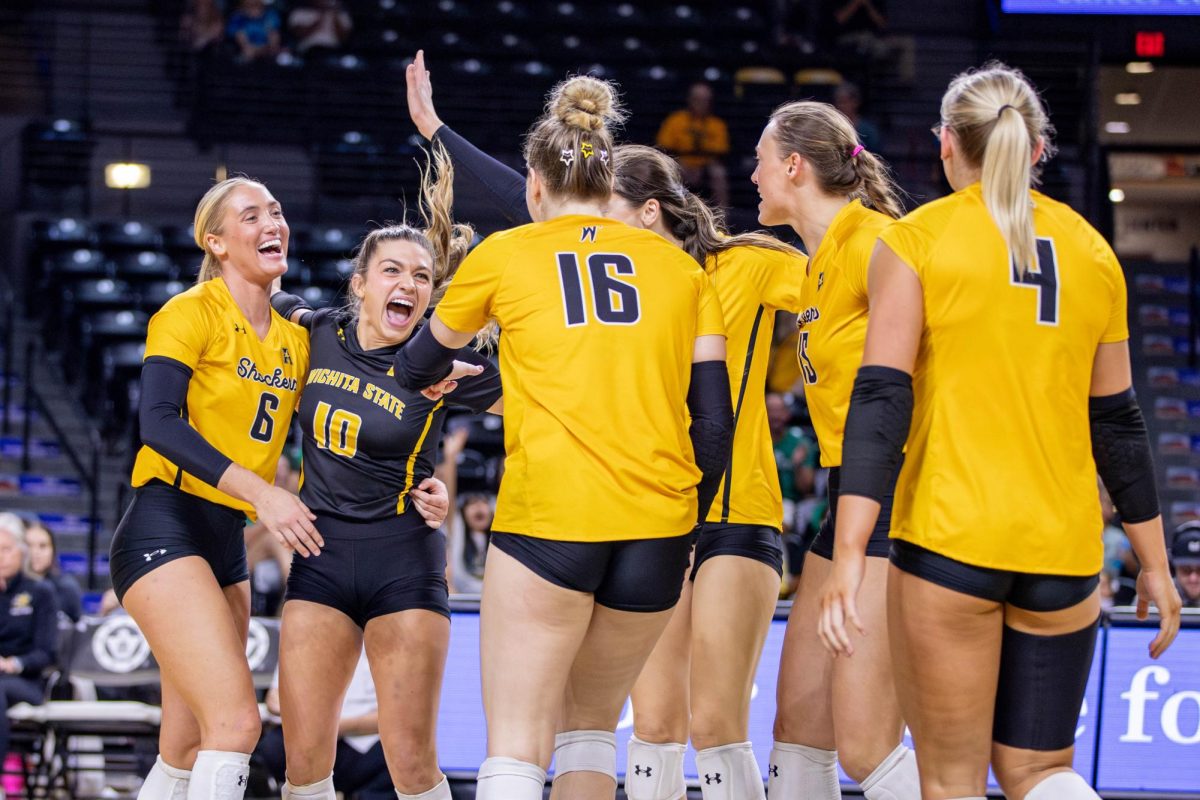 The Wichita State Shockers celebrate after winning the point on a long volley. The Shockers fell to Rice 3-2 on Oct. 6.