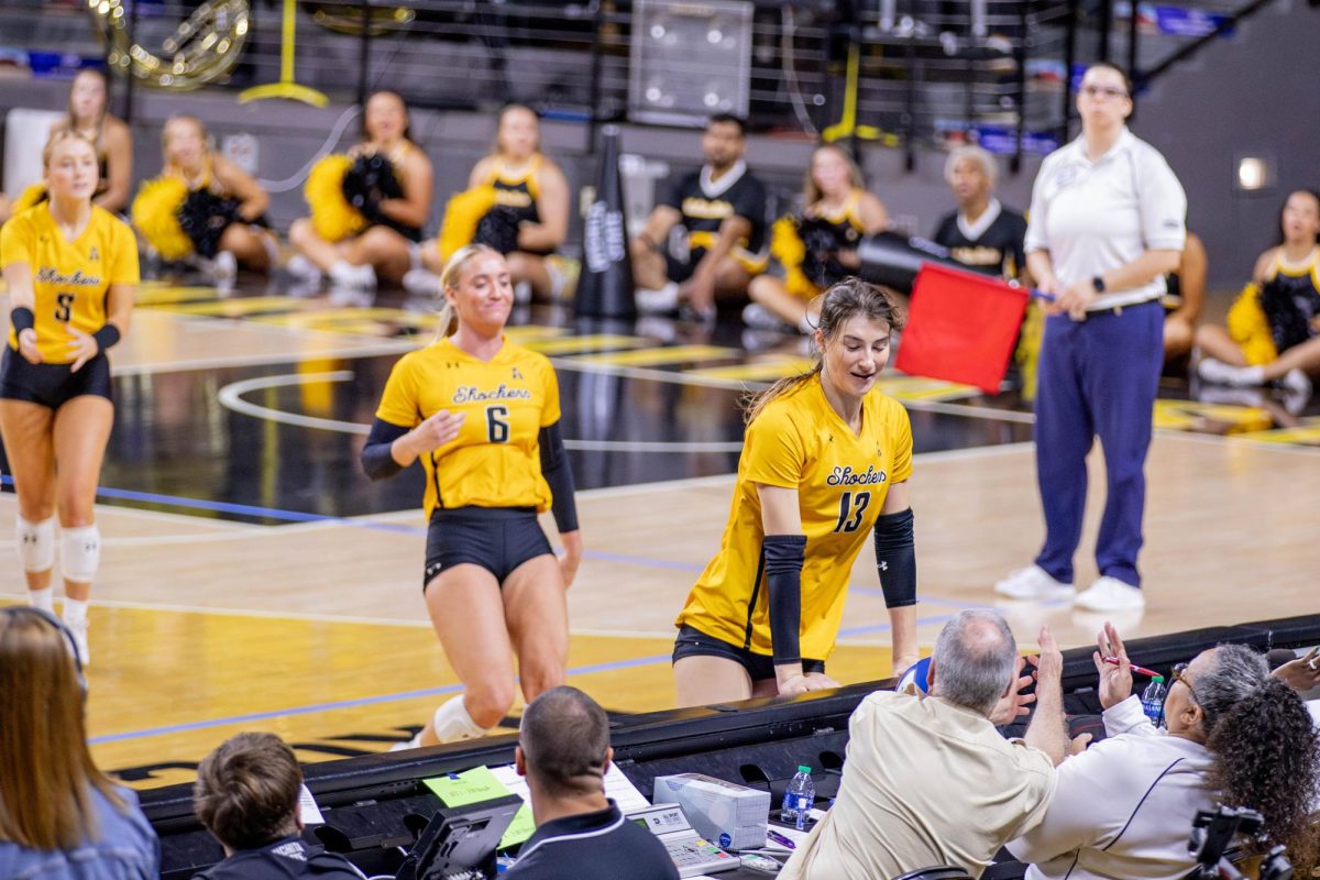 Emerson Wilford runs to save a ball that lands on a table in the fourth set. Wilford scored 10 kills and nine digs during the game.