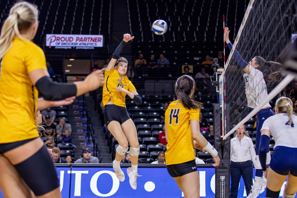 Emerson Wilford hits the ball over the net in the fourth set. Wilford scored 10 kills and nine digs during the game.