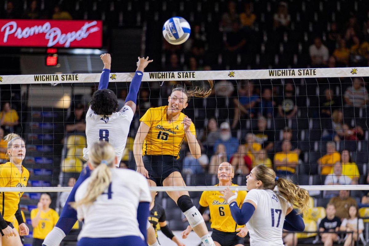 Morgan Stout attempts a kill against Rice on Oct. 6. The Shockers fell to the Owls 3-2, and faced their first conference loss this season.