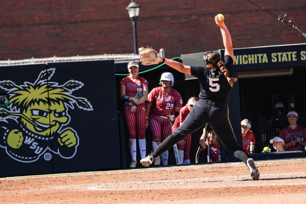 Freshman Ava Sliger delivers a pitch during the game on Oct. 5. During her senior year in high school, Sliger showcased her skills by recording 284 strikeouts while allowing only 19 walks.