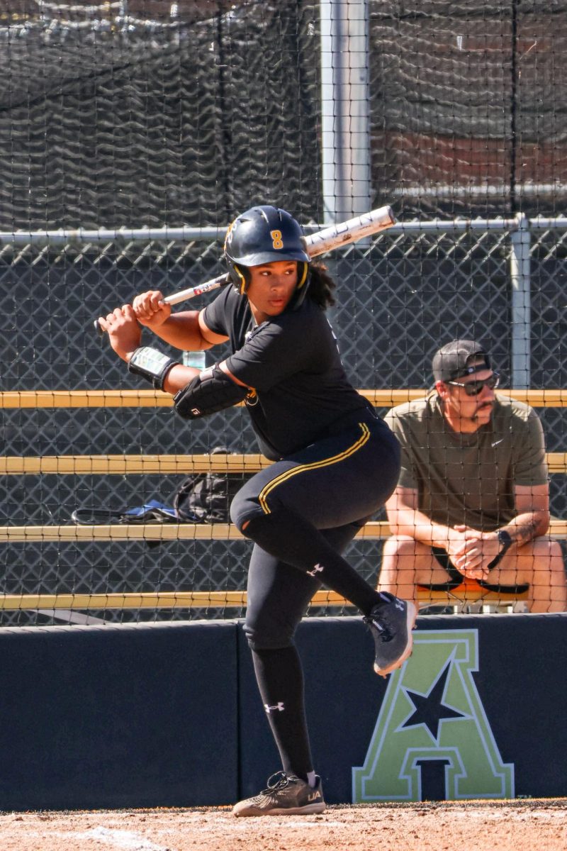 Sophomore Sydney Zenon prepares to swing at a pitch on Oct. 5. As a true freshman last season, Zenon recorded five hits, including a triple and a home run.