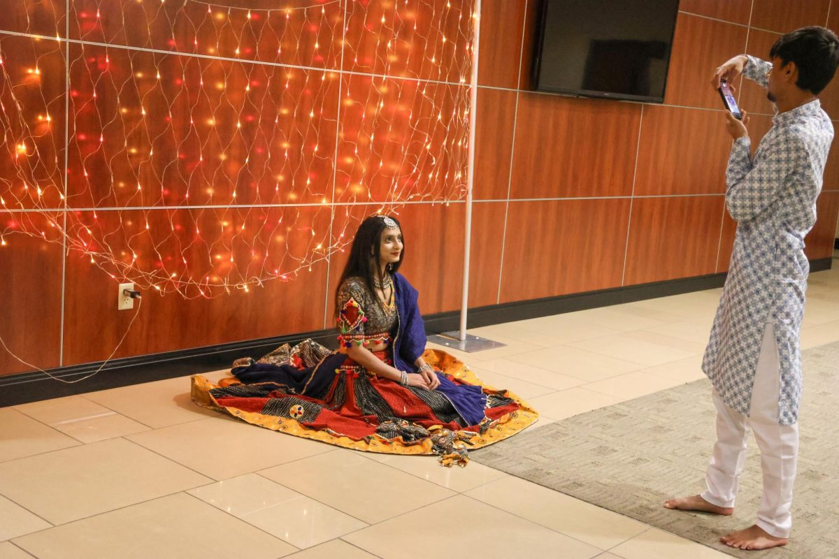 Prajakta Hatkar poses for a photo wearing traditional Chaniya Choli clothing at The Association of Hindu Students in America's Garba Night. 