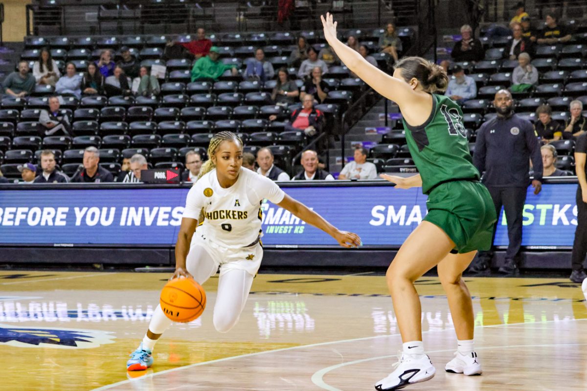 Graduate student Taylor Jameson goes around a Northeastern State player during the exhibition game on Oct. 30. Last year, Jameson appeared in all 31 games as a senior at George Mason.