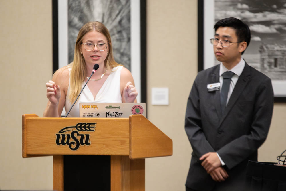 Student Body President Kylee Hower proposes a bill that would allocate an expenditure from the special projects and capital fund to replace the roof of the Rhatigan Student Center on Wednesday, Oct. 9. The piece of legislation was passed with unanimous consent.