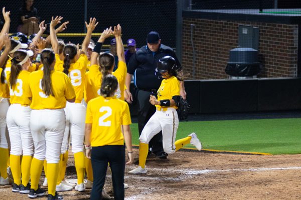 Junior Jodie Epperson runs home to celebrate a home run with her team on Oct. 3. Epperson previously played for North Texas for two years, playing in 72 games with a batting average of .235.