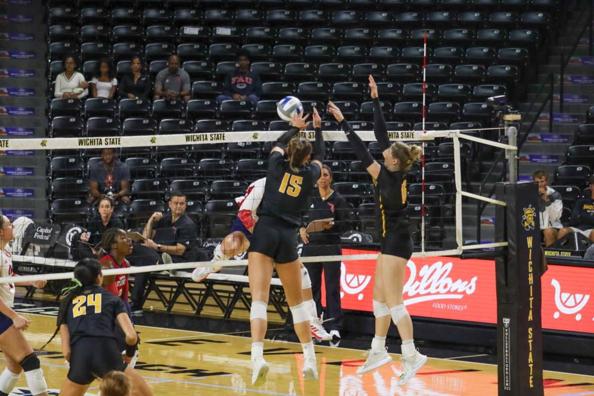 Senior Morgan Stout and fifth-year Izzi Strand block the ball from the WSU side of the court. Both players had multiple blocks against the Florida Atlantic Owls.