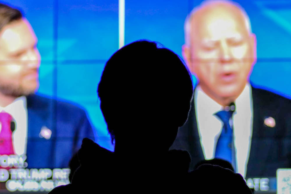 Christopher Montford, an aerospace engineering major, watches candidates JD Vance and Tim Walz during the vice presidential debate watch party on Oct. 1.