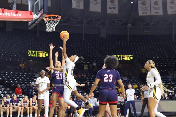 Sophomore Salese Blow goes for a layup against a Belmont defender. Blow scored a team-leading 16 points on Nov. 9.