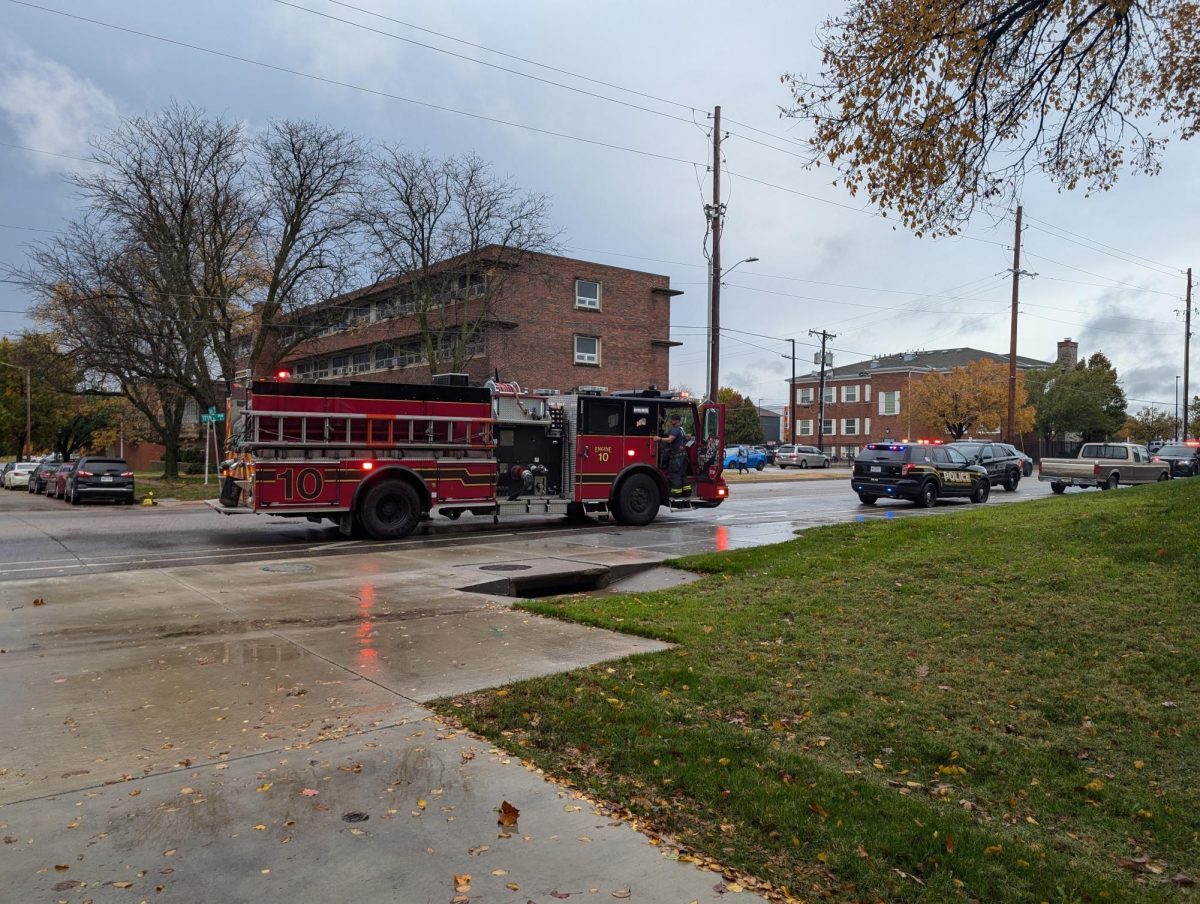 Emergency vehicles parked on 17th St. near Wichita State's campus. A fire truck, ambulance and police were on the scene for an accident on Nov. 18