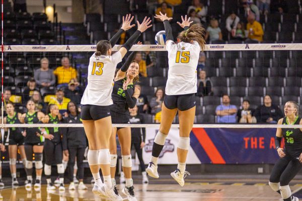 Junior outside hitter Emerson Wilford and senior middle blocker Morgan Stout block a South Florida kill attempt during the AAC Tournament semifinals on Nov. 23. Wichita State won the game and will play in the finals against Florida Atlantic on Nov. 24.