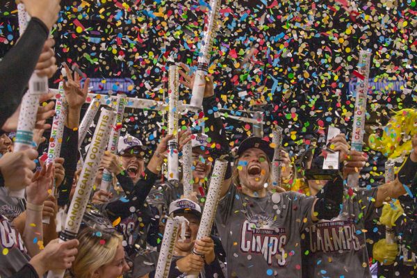 The Wichita State volleyball team celebrates their win in the AAC tournament on Nov. 24. The Shockers swept Florida Atlantic in the championship game.