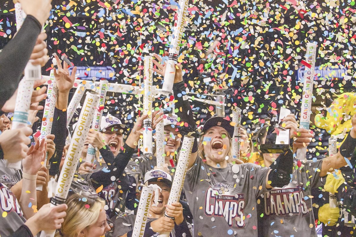 The Wichita State volleyball team celebrates their win in the AAC tournament on Nov. 24. The Shockers swept Florida Atlantic in the championship game.