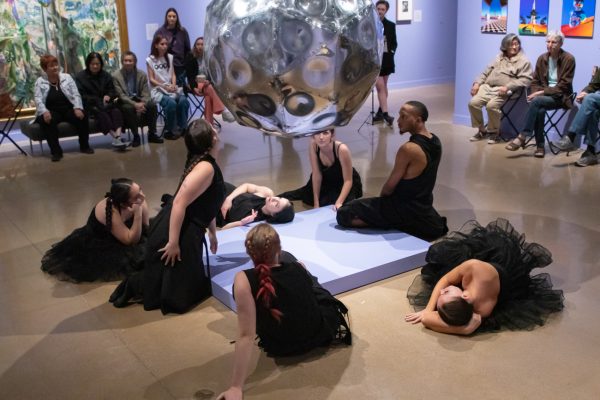 Students from the WSU dance program prepare to begin the "Inside the Dream Machine" performance at the Ulrich Museum on Nov. 15. The performance was choreographed by Program Director Mina Estrada in collaboration with the dancers.