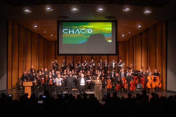 The WSU Symphony Orchestra stands to receive a standing ovation from the audience after performing "Symphony Chaco" on Nov. 21. The performance was held in the Miller Concert Hall inside the Duerksen Fine Arts Center.