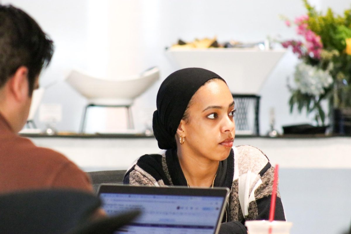 ADI member Haneen Elamin listens to the panel members discuss what obstacles they faced in their career paths Nov. 12.