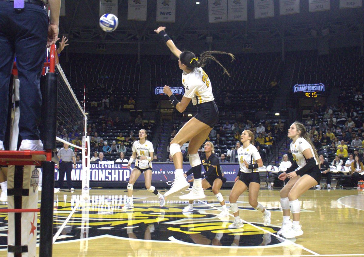 Freshman outside hitter Alyssa Gonzales returns a hit during the AAC quarterfinal match against the University of Tulsa. The Shockers defeated Tulsa, 3-0, and will advance to the semifinal game against the top-seeded University of South Florida.
