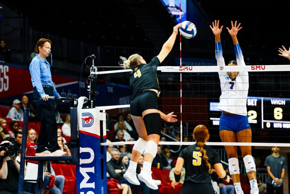 Junior outside hitter Brooklyn Leggett attempts a kill against SMU in the NCAA Tournament (Photo courtesy of Brian Barnes/Wichita State Athletics).