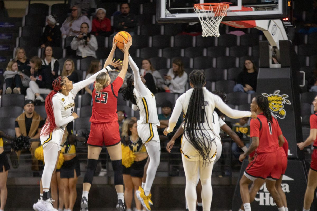 Senior forward Ornella Niankan blocks a Western Kentucky shot on Dec. 8. Niankan blocked one shot in the WSU win and scored eight points.