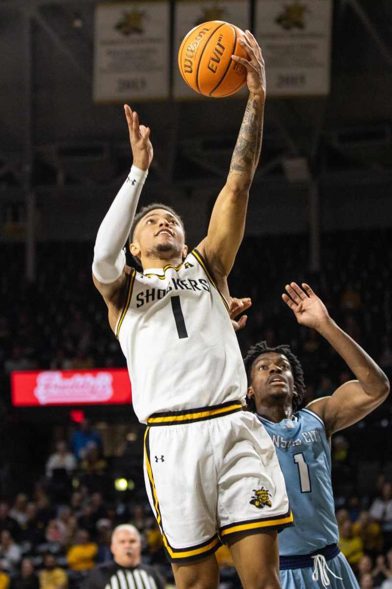 Senior guard Xavier Bell attempts to make a layup on Kansas City during the Dec. 17 game. Bell scored 21 points during the game, but the Shockers ultimately lost 74-64 to the Roos.