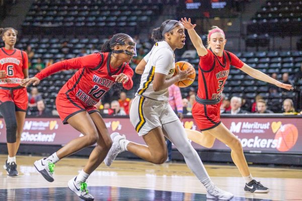 Sophomore guard Salese Blow drives into the paint against Western Kentucky. Blow led the Shockers with 13 points in the Dec. 8 win.