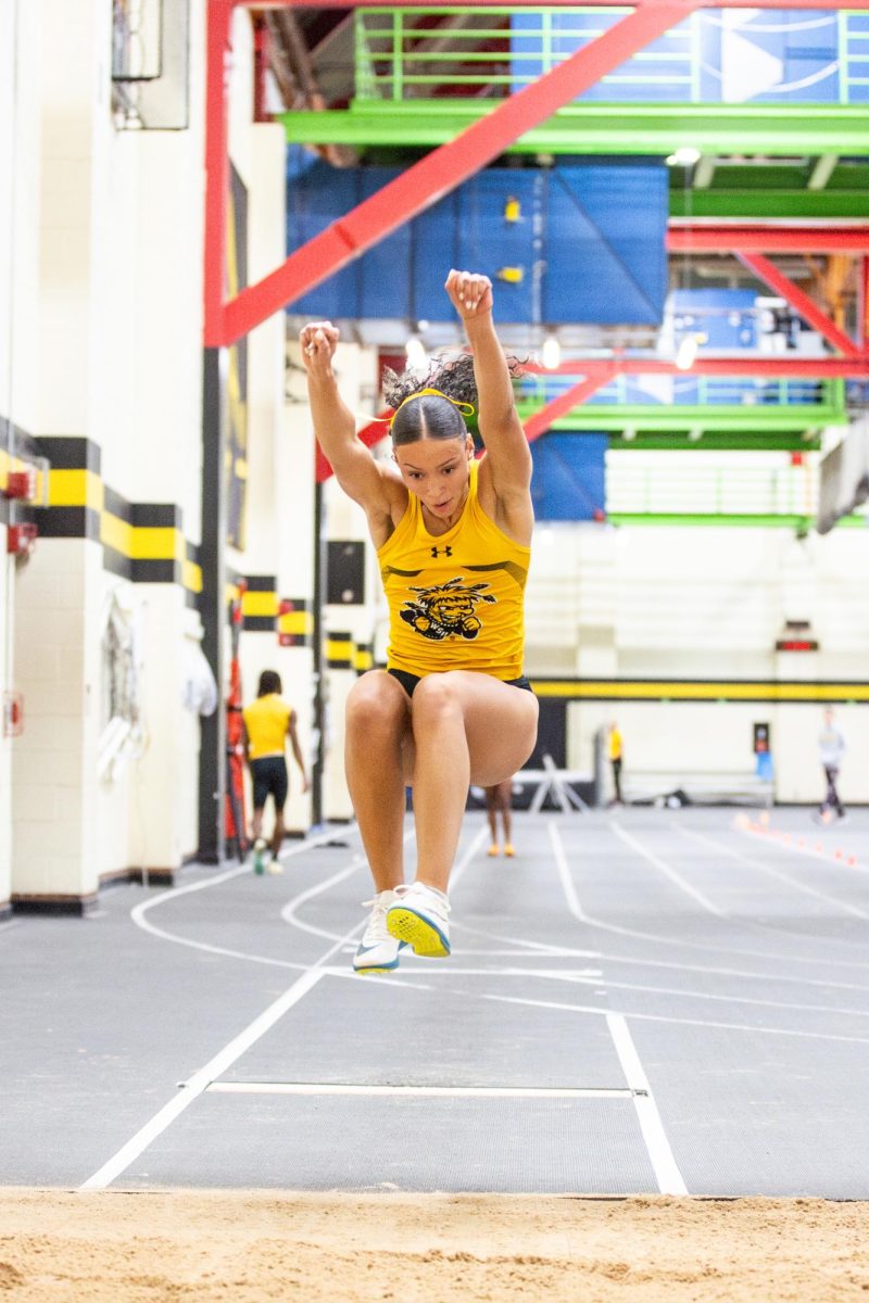 Sonya Haylor jumps forward during the Black vs. Yellow Intrasquad event on Dec. 6.