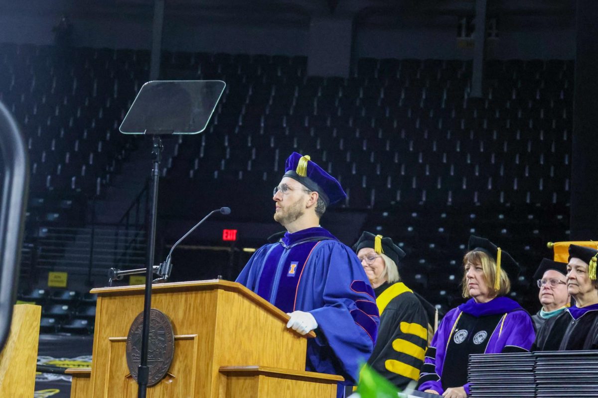 Matthew Muether speaks at the opening of the ceremony. Muether is the faculty senate president.