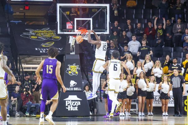 Senior center Quincy Ballard throws down a two-handed slam in the first half. The Shockers beat Alcorn State, 78-54, on Dec. 4