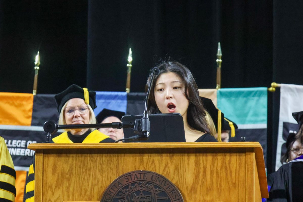 Pulip Han sings the Alma Mater Han is music opera performance student.