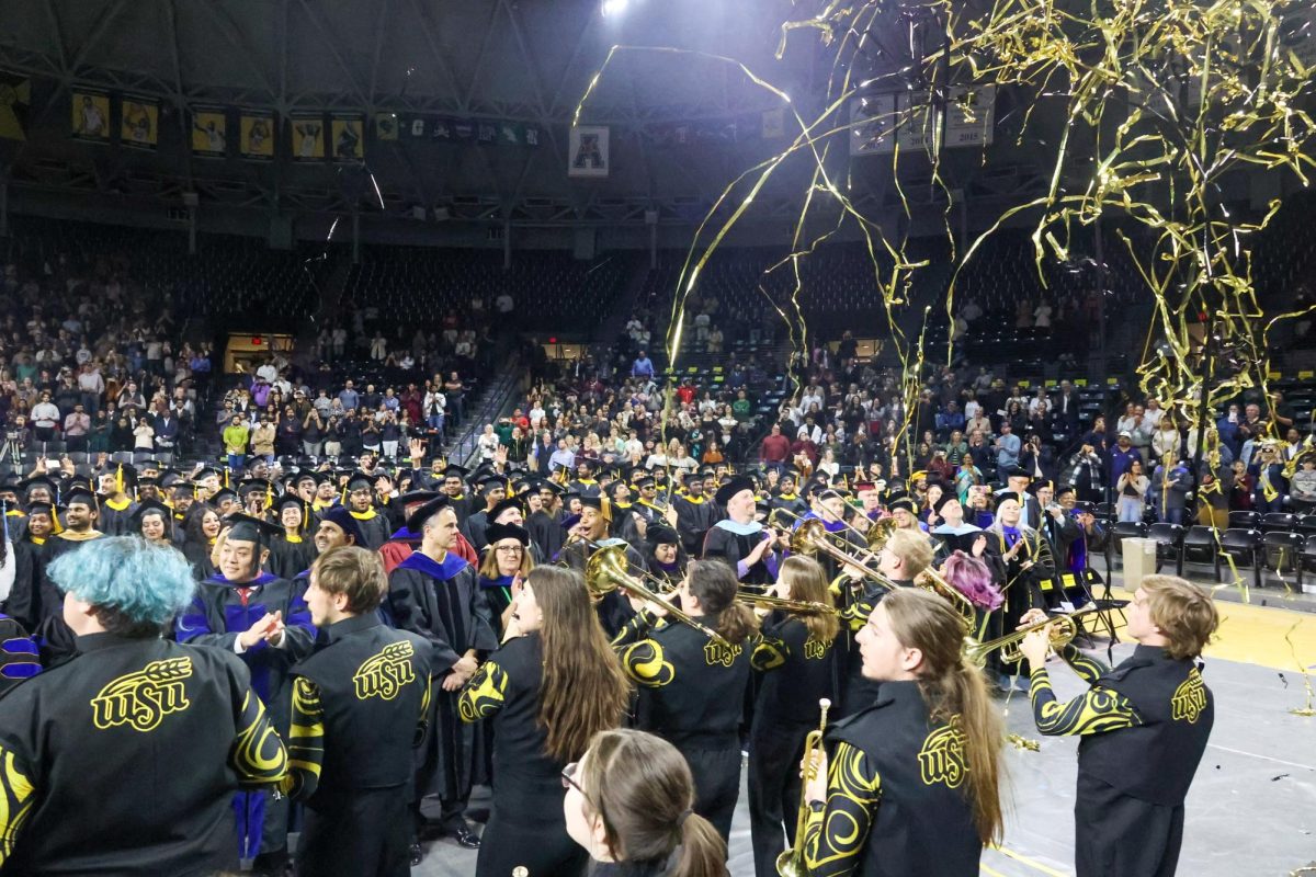 Streamers fall at the conclusion of the ceremony.