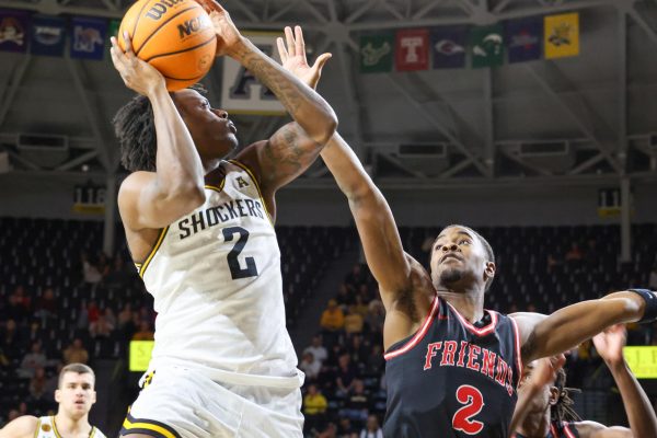 Freshman guard Zion Pipkin goes up for shot in the second half against Friends. Pipkin finished with two points.