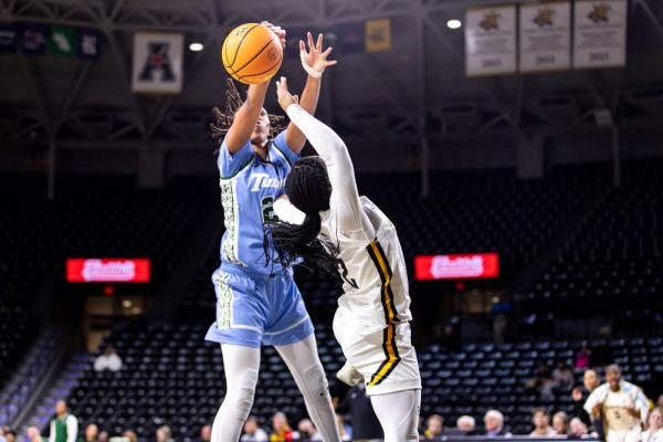 A shot by KP Parr is blocked by a Tulane player on Jan. 15. Parr scored two points and three rebounds against Tulane.