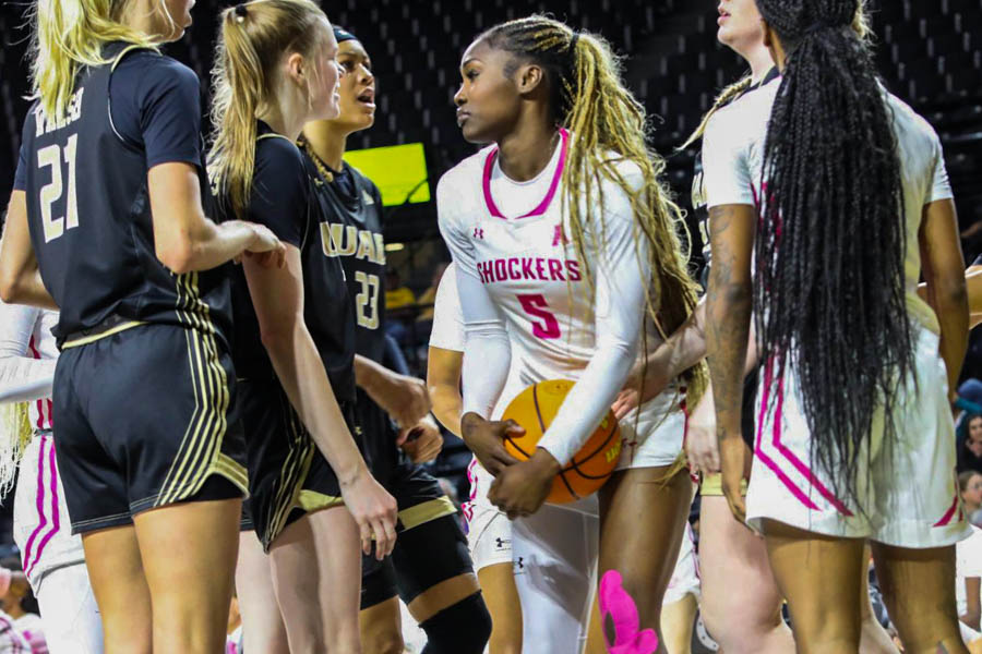 UAB players surround Wichita State forward Ornella Niankan during their Jan. 25 game. The Shockers dropped their matchup against the Blazers in overtime, 76-73.