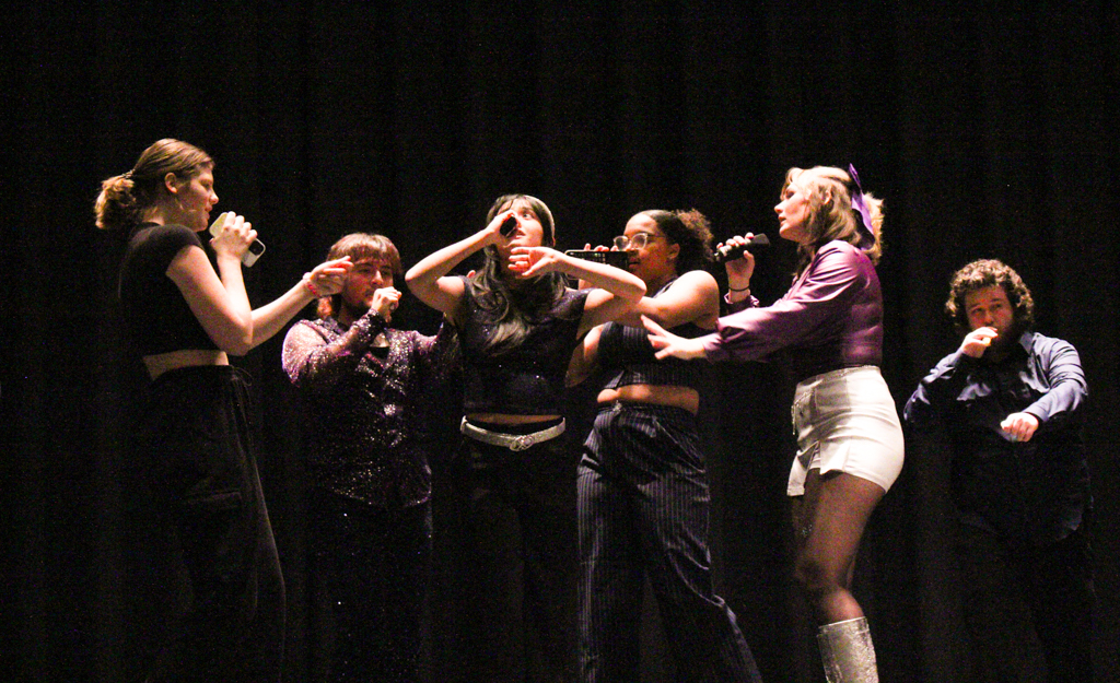 The Shockappellas are performing Saturn by Sza. They hosted an open dress rehearsal in preparation for their Nebraska competition.