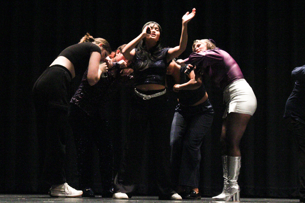 Soloist sings to "Saturn" by SZA. The Shockappellas hosted an open dress rehearsal in preparation for their Nebraska competition.