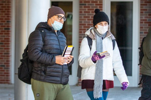 Juan Barrientos and Gabriela Gomez, students at Wichita State, search for Beggs Hall on the first day back for in-person classes. Wichita State started its first day of classes remotely before resuming in person on Wednesday, Jan. 22.