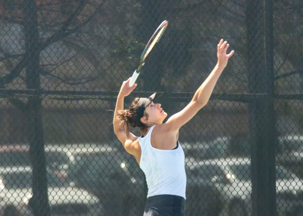 Sophomore Theodora Chantava gets ready to serve for a match against the University of Tulsa. Chantava's singles match was left unfinished on April 8, 2024.