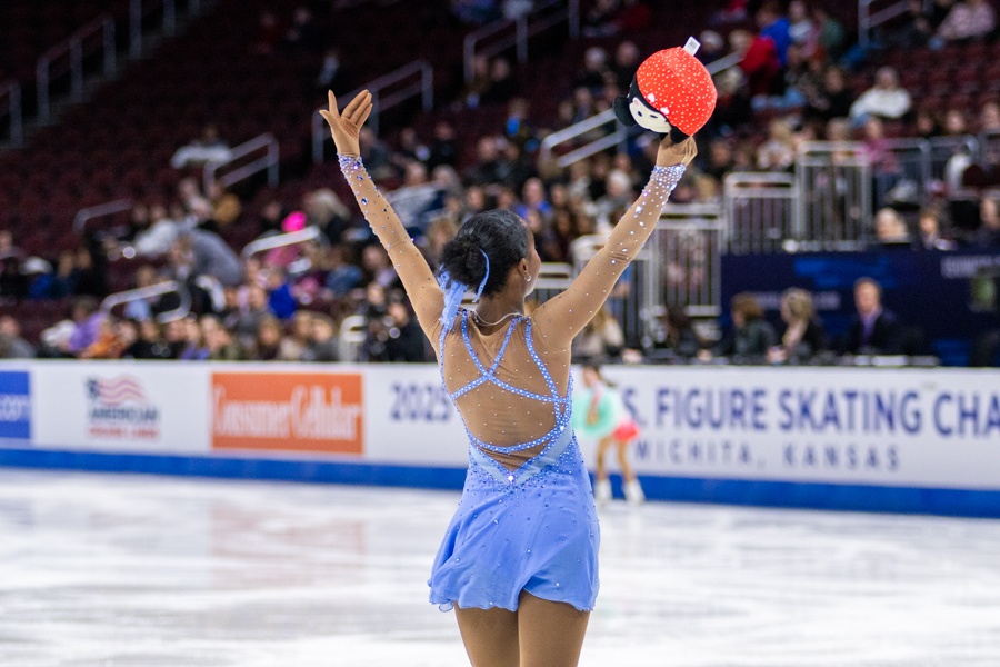 Starr Andrews bows and waves to ice skating fans with a Mickey Mouse plush in hand. Andrews placed 12th with a score of 59.45 in the Championship Women / Short Program competition.